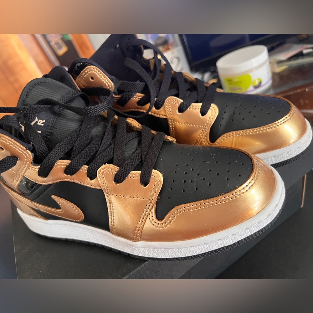 Air Jordan One gold and black